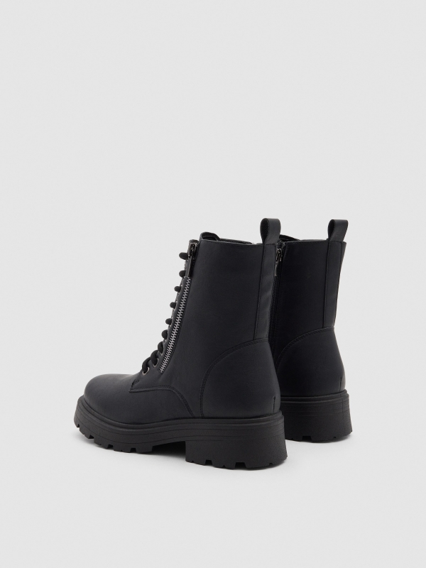 Black military boot with track sole black 45º back view