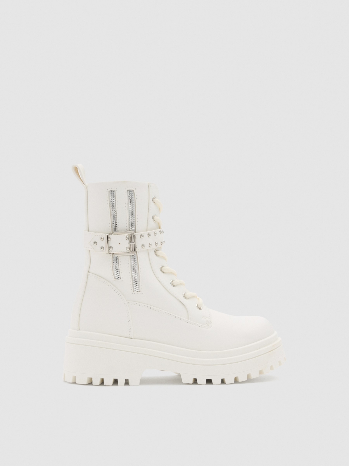 Lace-up boots and white strap white profile view