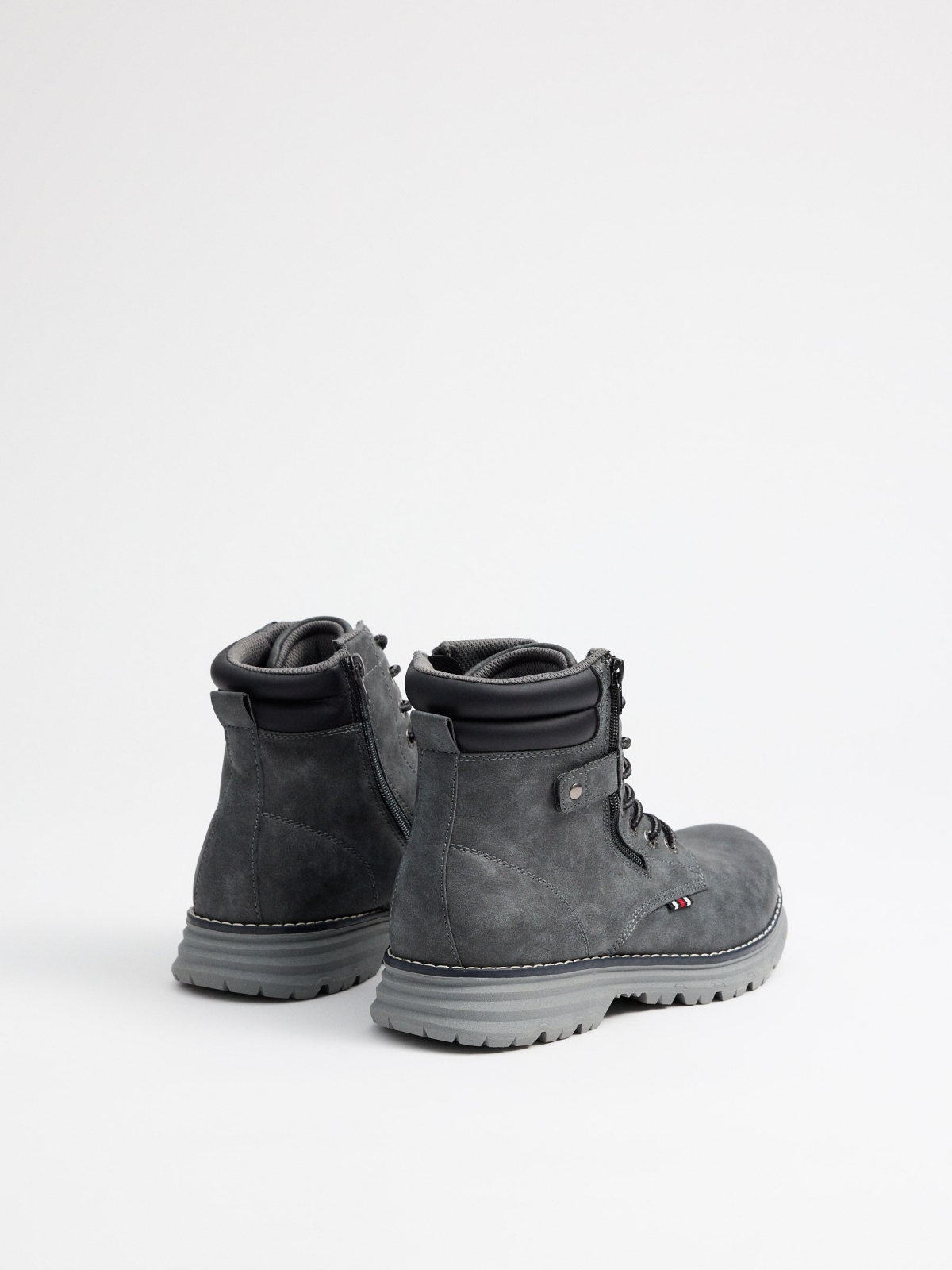 Grey mountaineering boot dark grey 45º back view