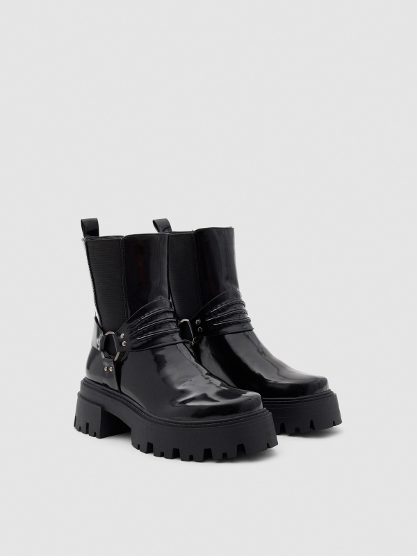 Patent leather ankle boots with straps black 45º front view