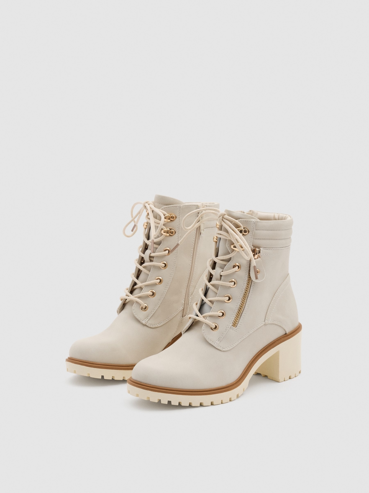 Beige lace-up heeled boots beige 45º front view