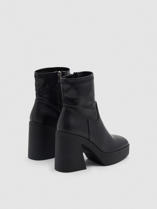 Square heel boot black 45º back view