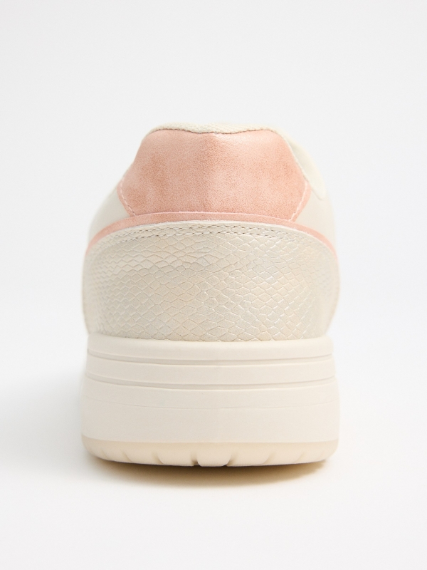 Sports shoes with mesh panels sand detail view