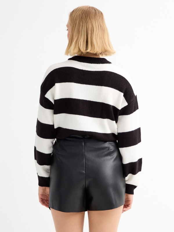 Black and white striped jumper black middle back view