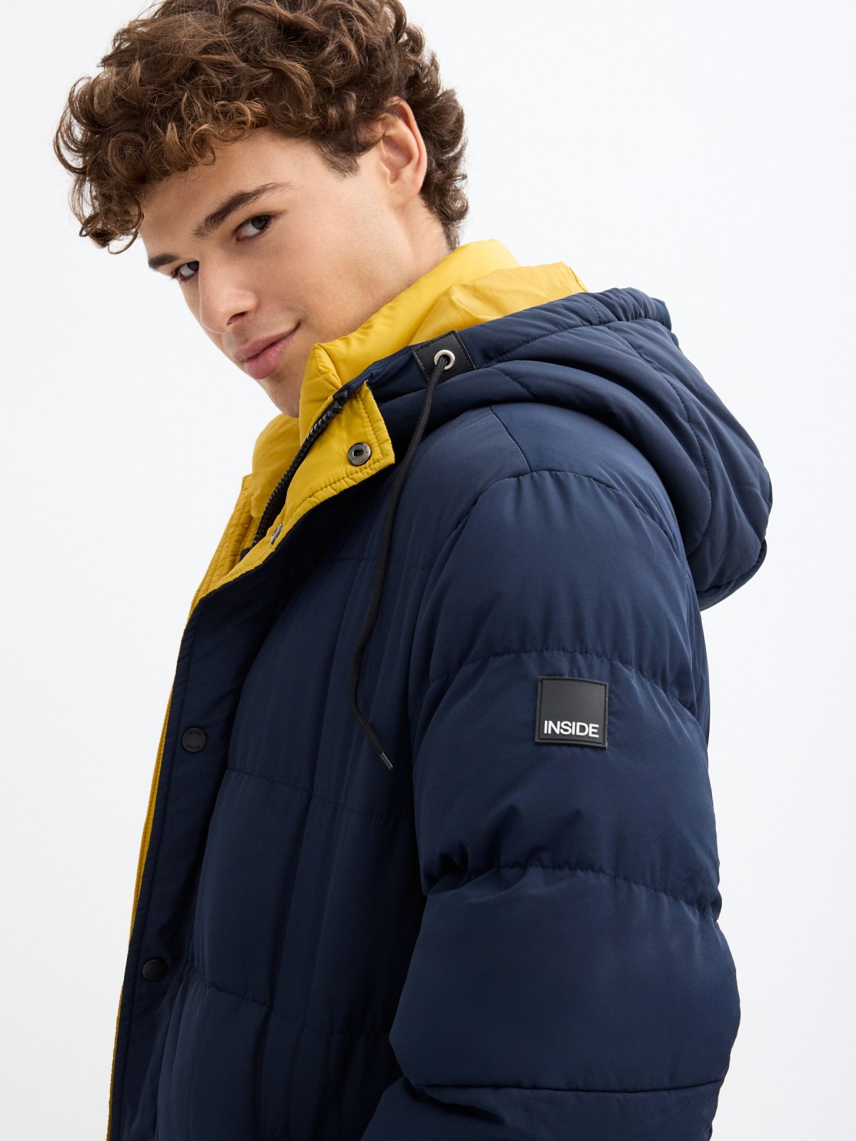 Contrast padded jacket navy detail view