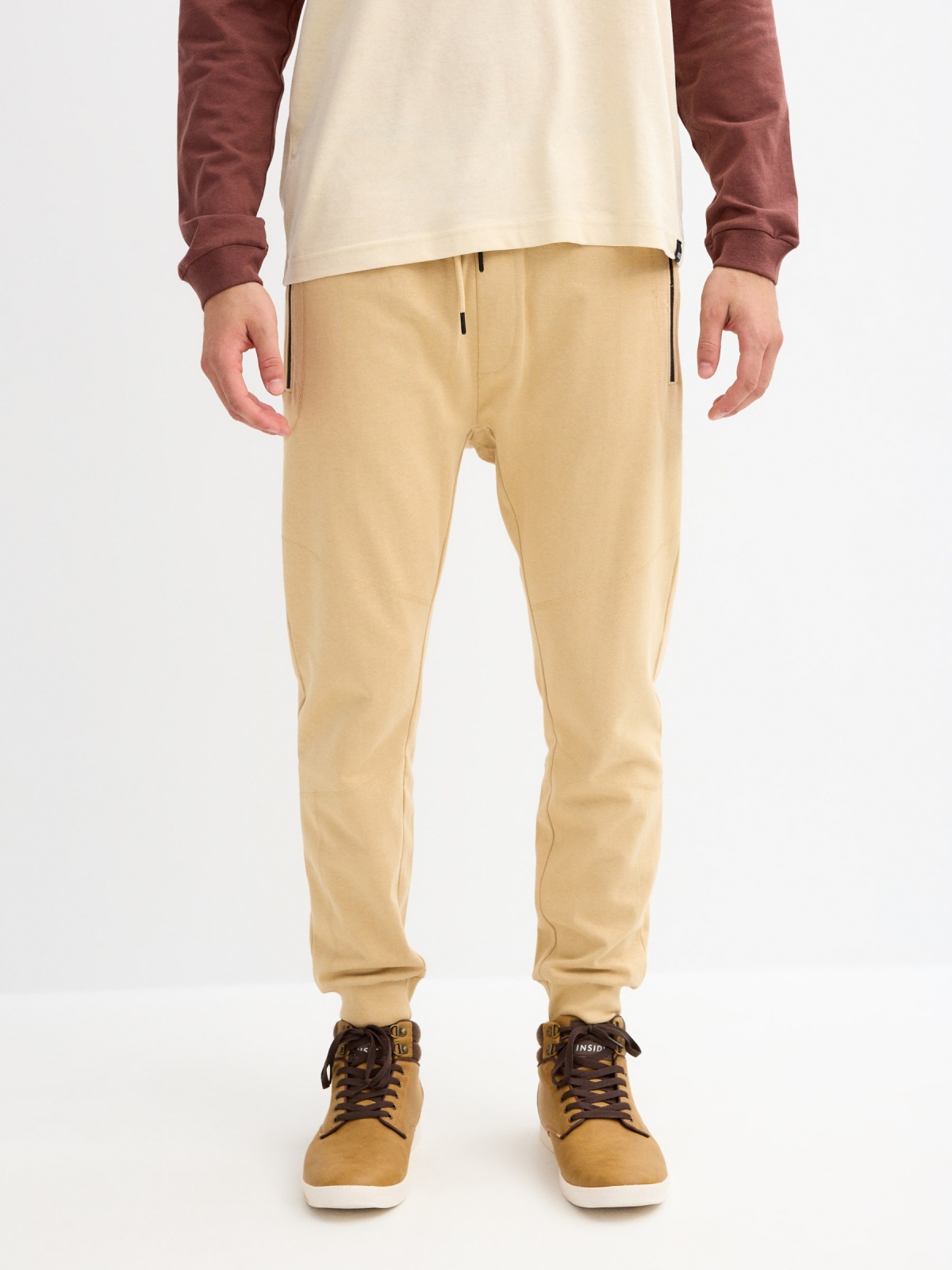 Jogger pants with pockets sand middle front view