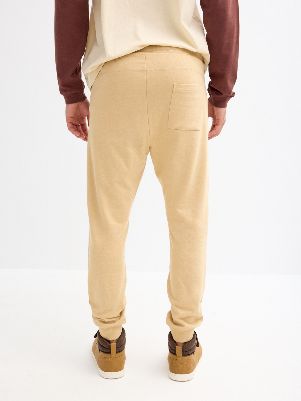 Jogger pants with pockets sand middle back view