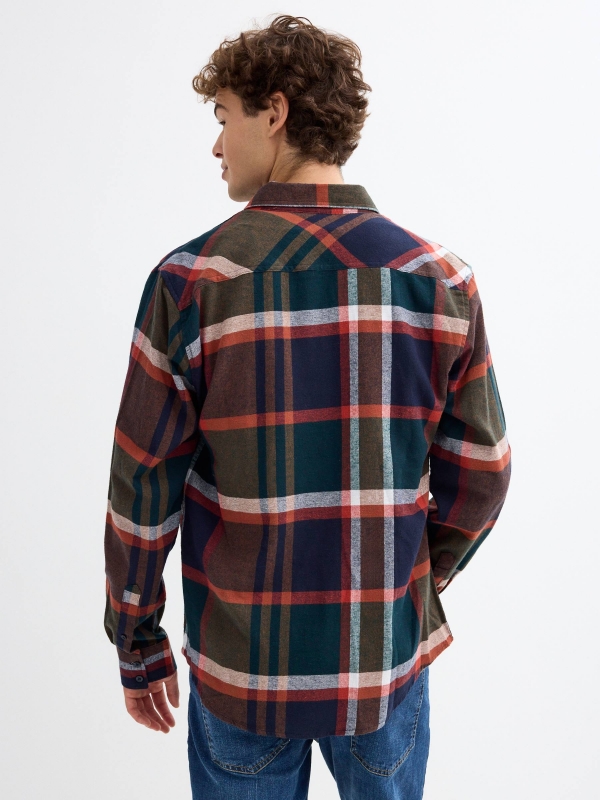 Green flannel shirt blue middle back view