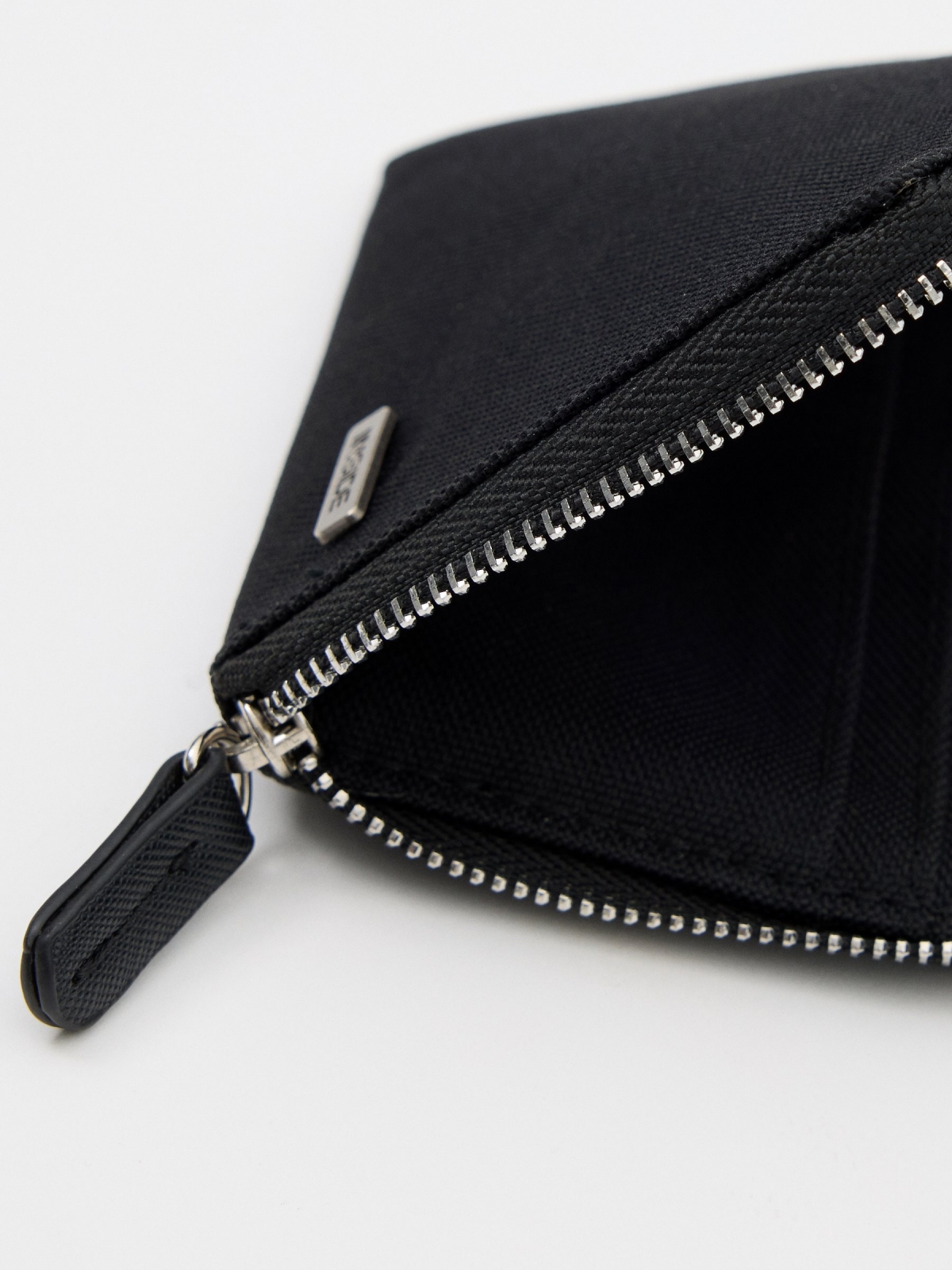 Black canvas purse black 45º side view