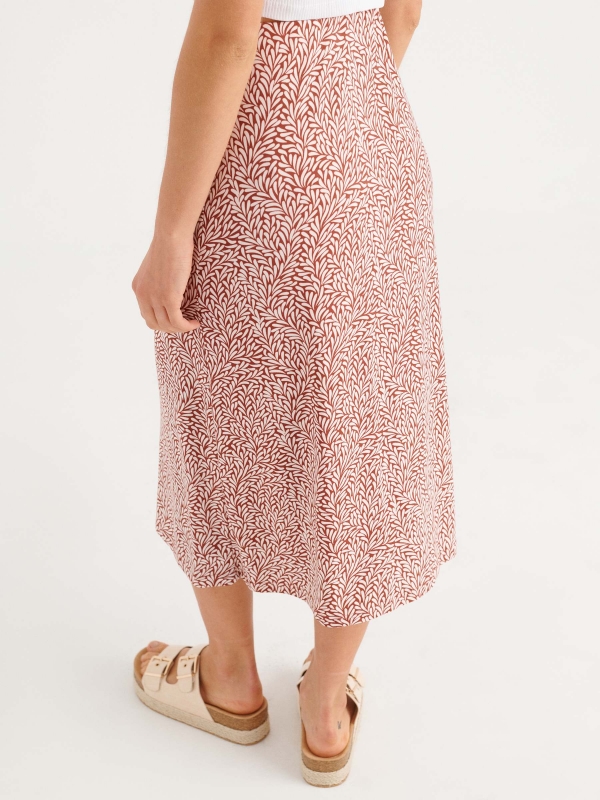 Printed midi skirt brick red detail view