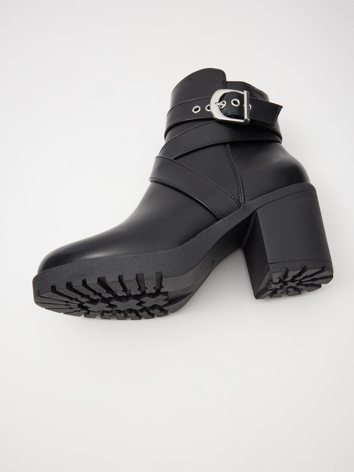 Heeled ankle boots with buckle detail view