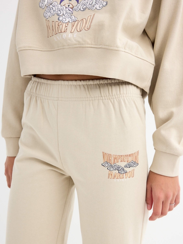  Calças jogger com print gráfico taupe