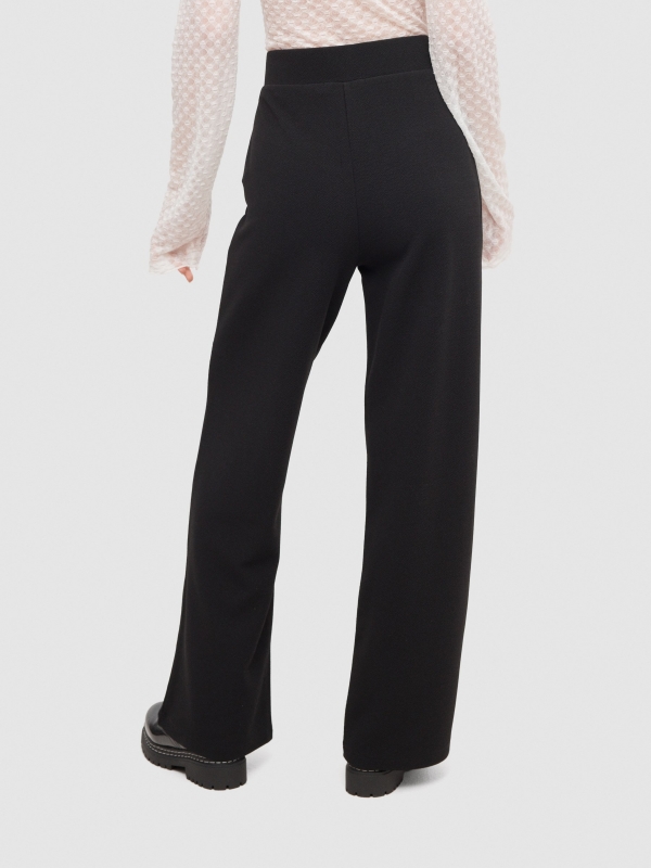 Palazzo pants with button black middle back view