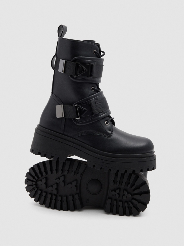 Black military boot with buckles black detail view