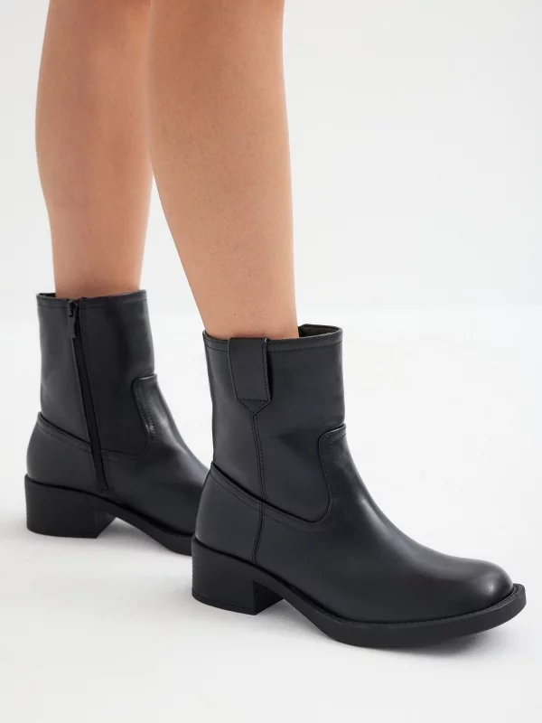 Basic faux leather ankle boots black with a model