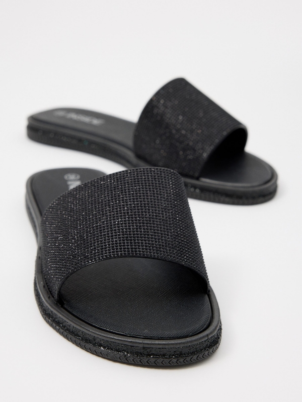 Black glitter shovel flip flops black detail view