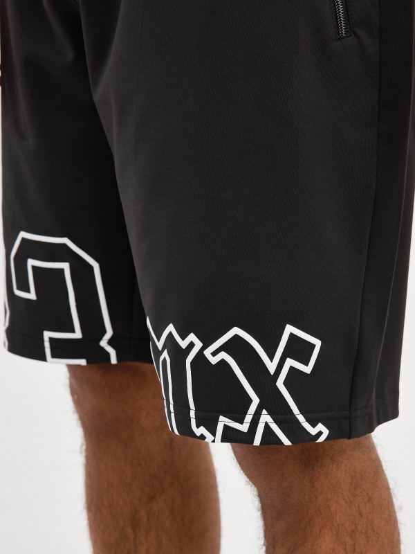 Printed Bermuda jogger shorts black detail view