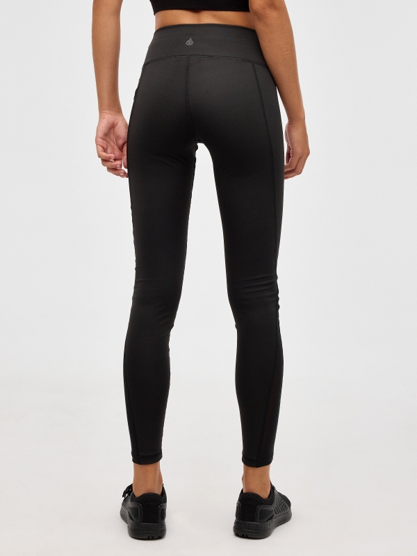 Leggings with mesh pocket black middle back view