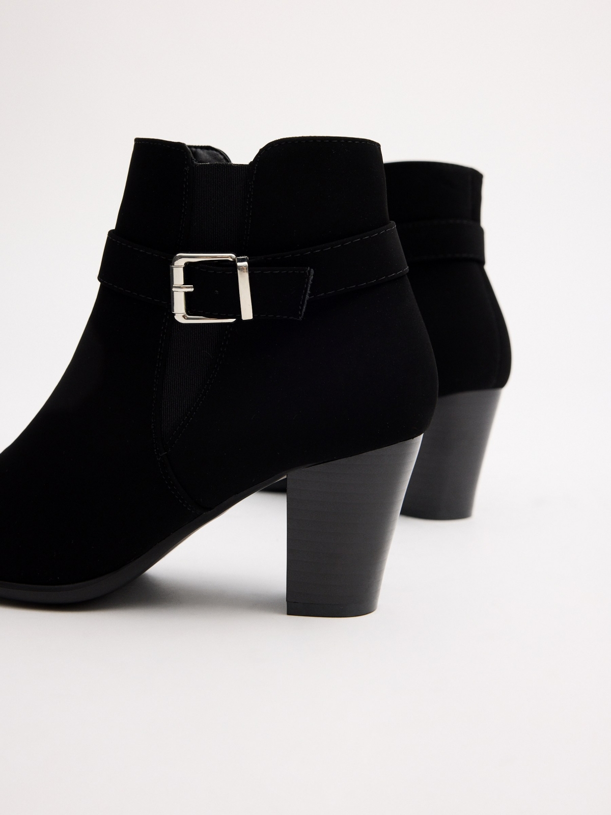 Black ankle boots with buckle heel black detail view