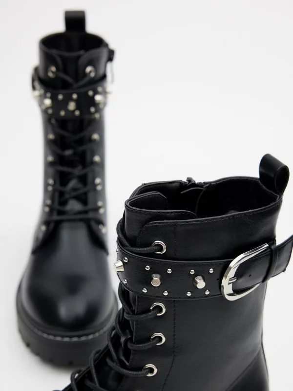 Lace-up boots with buckle and studs black detail view