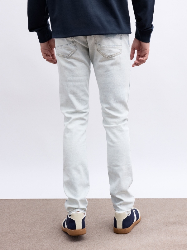 Light blue super slim jeans blue middle back view