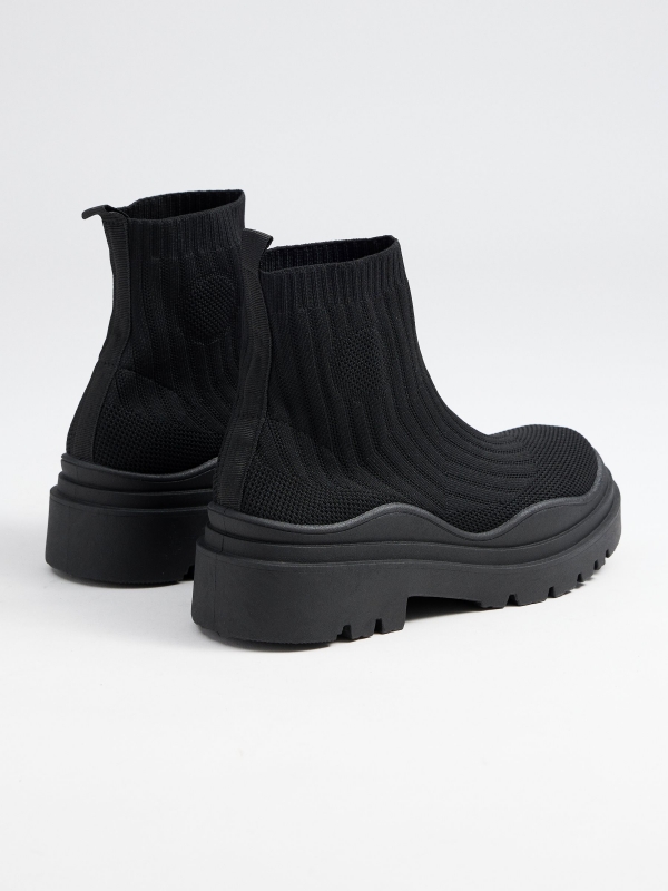 Elastic boot shoe black 45º back view