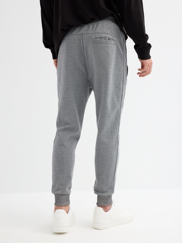 Textured jogger pants light grey middle back view