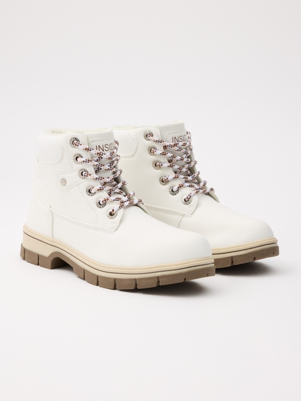 Mountaineering boot with platform white 45º front view