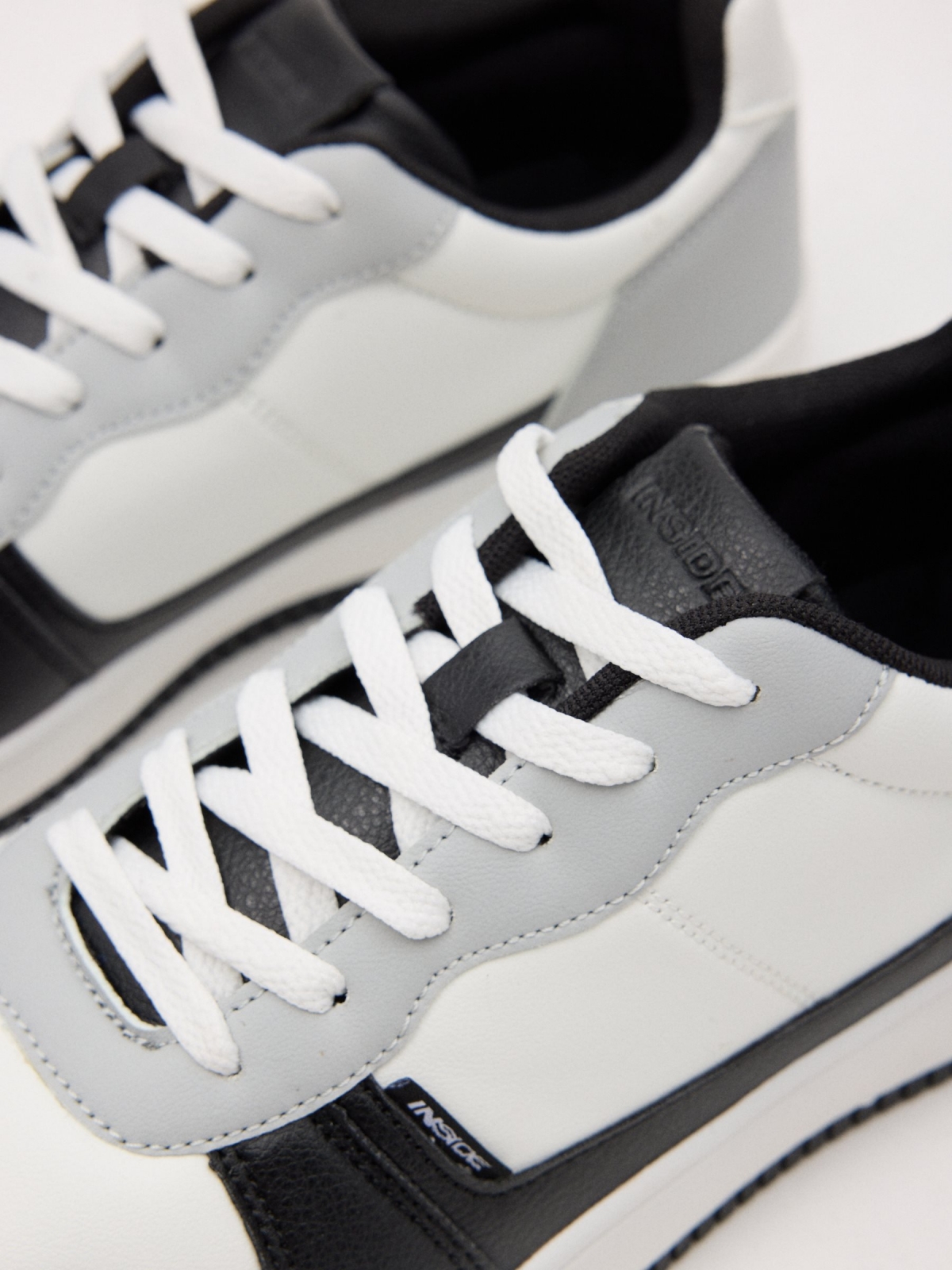 Casual leatherette sneaker detail view