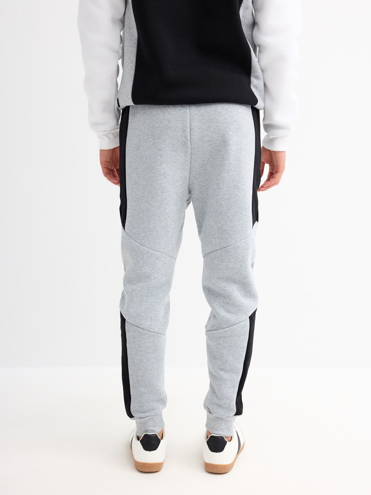 Block color jogger pants light grey middle back view