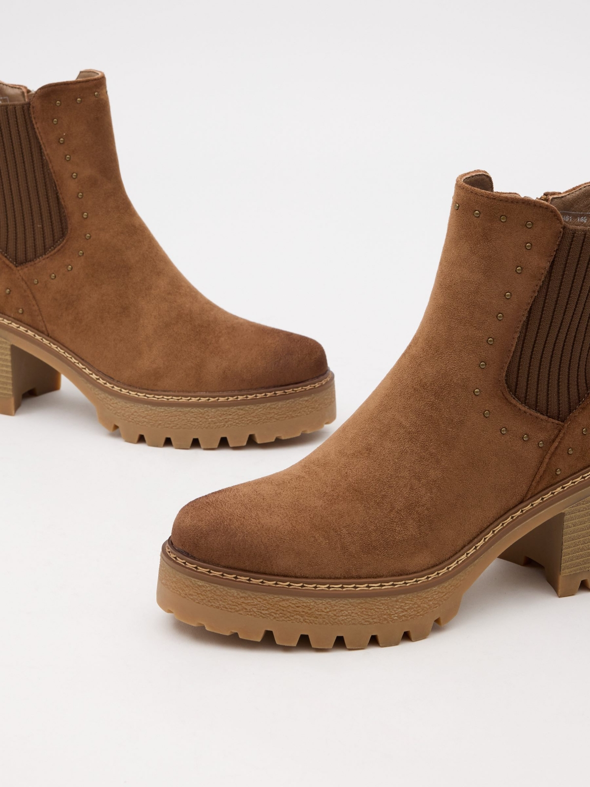 Platform ankle boots with studs brown detail view