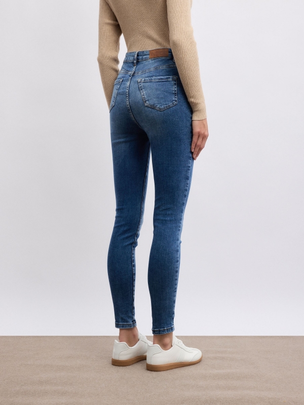 Denim skinny jeans blue middle back view