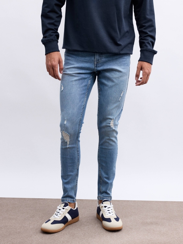 Ripped denim skinny jeans blue middle front view