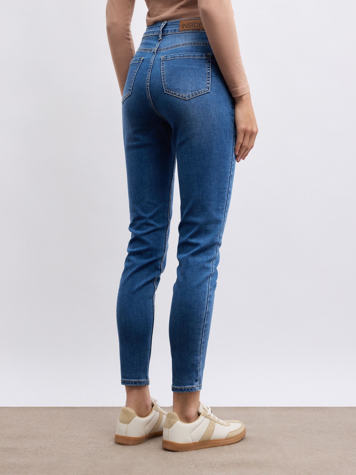 Basic skinny jeans medium rise blue middle back view