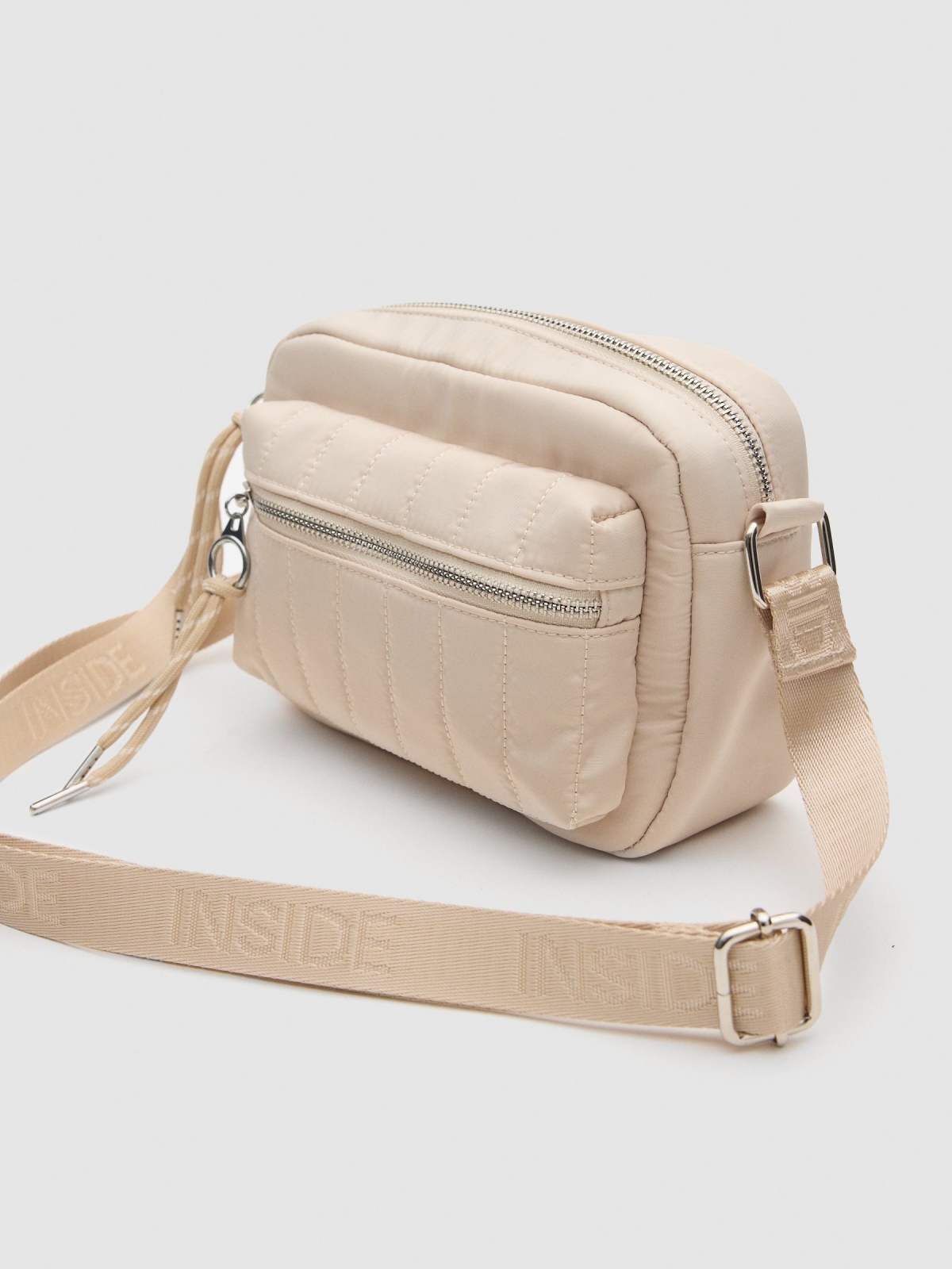 Padded nylon bag off white detail view