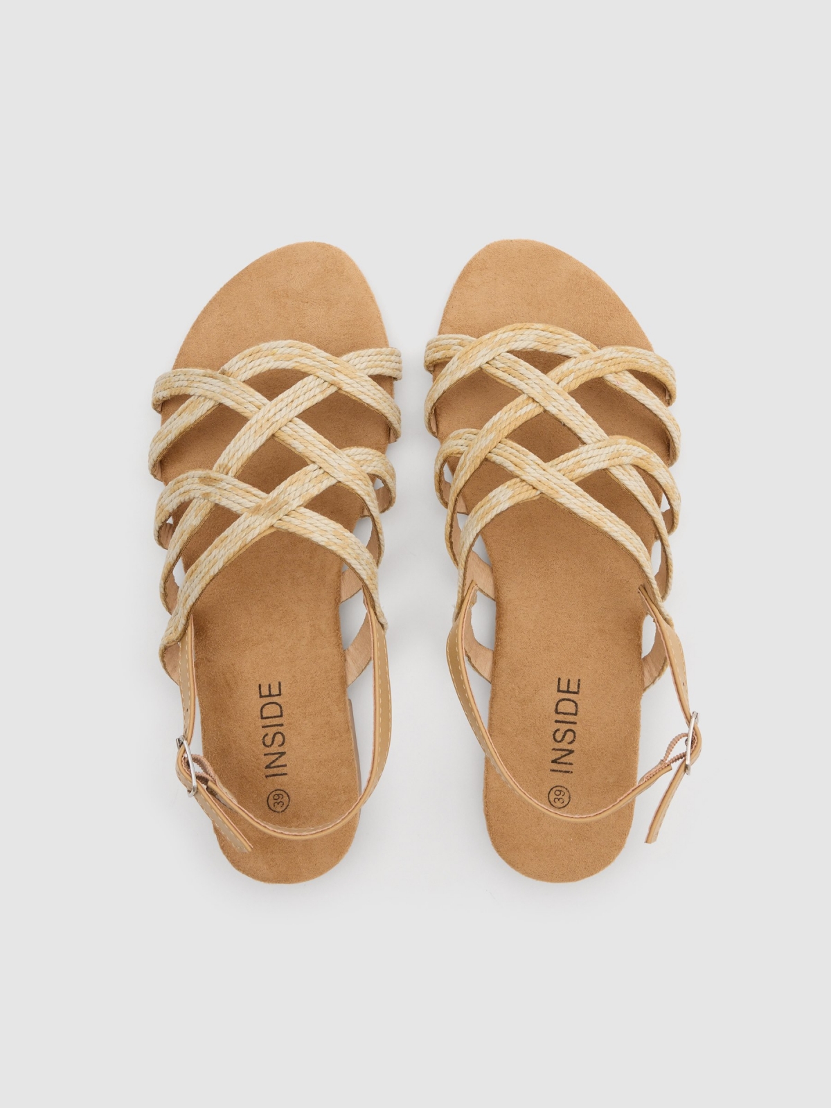 Raffia straps sandal sand zenithal view