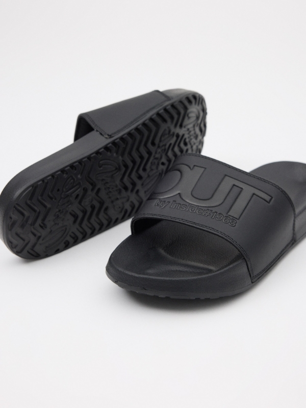 Embossed leather-effect shovel flip-flops black detail view