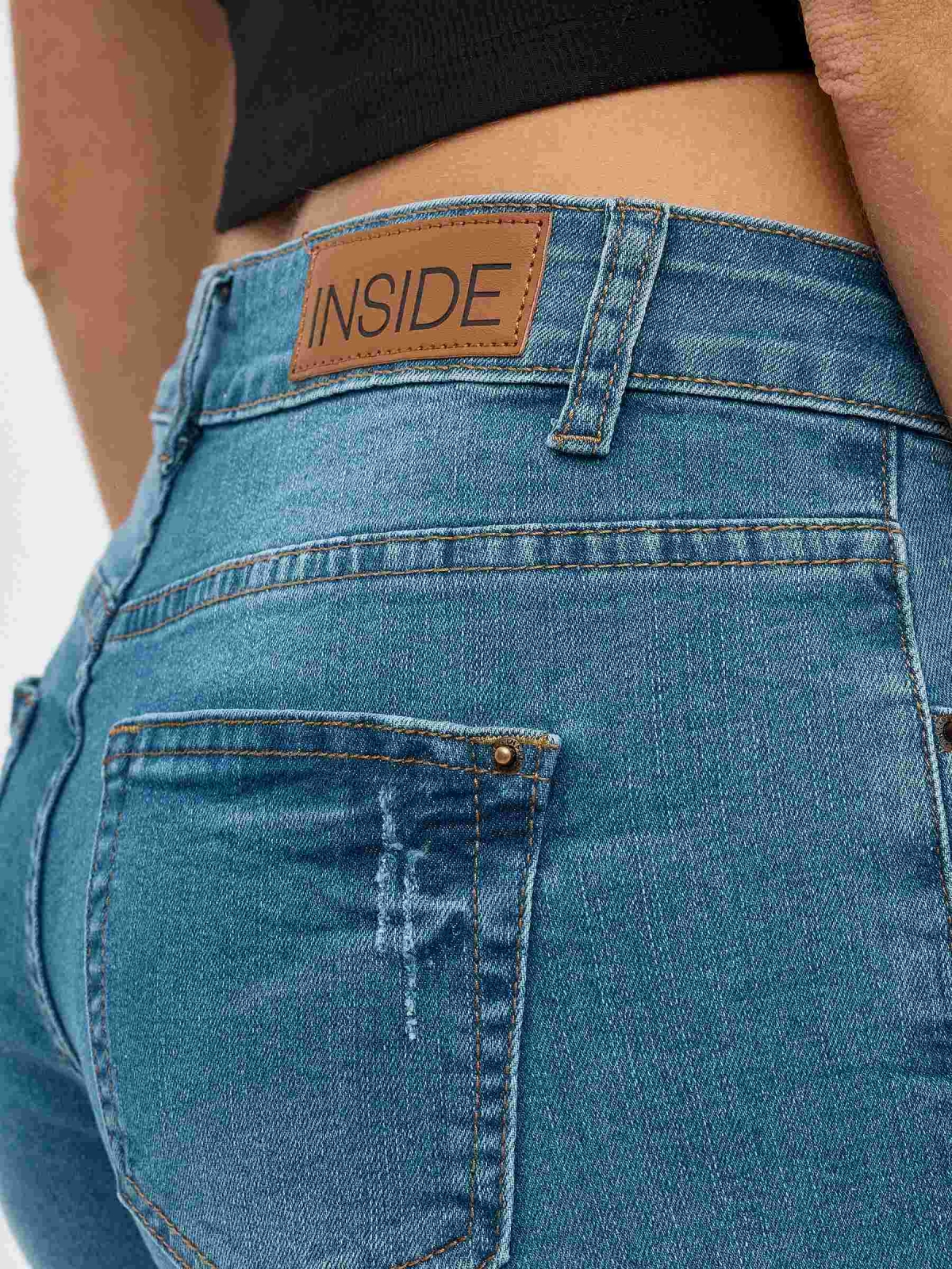 Frayed hem denim shorts blue detail view