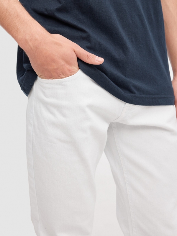 Plain coloured jeans white detail view