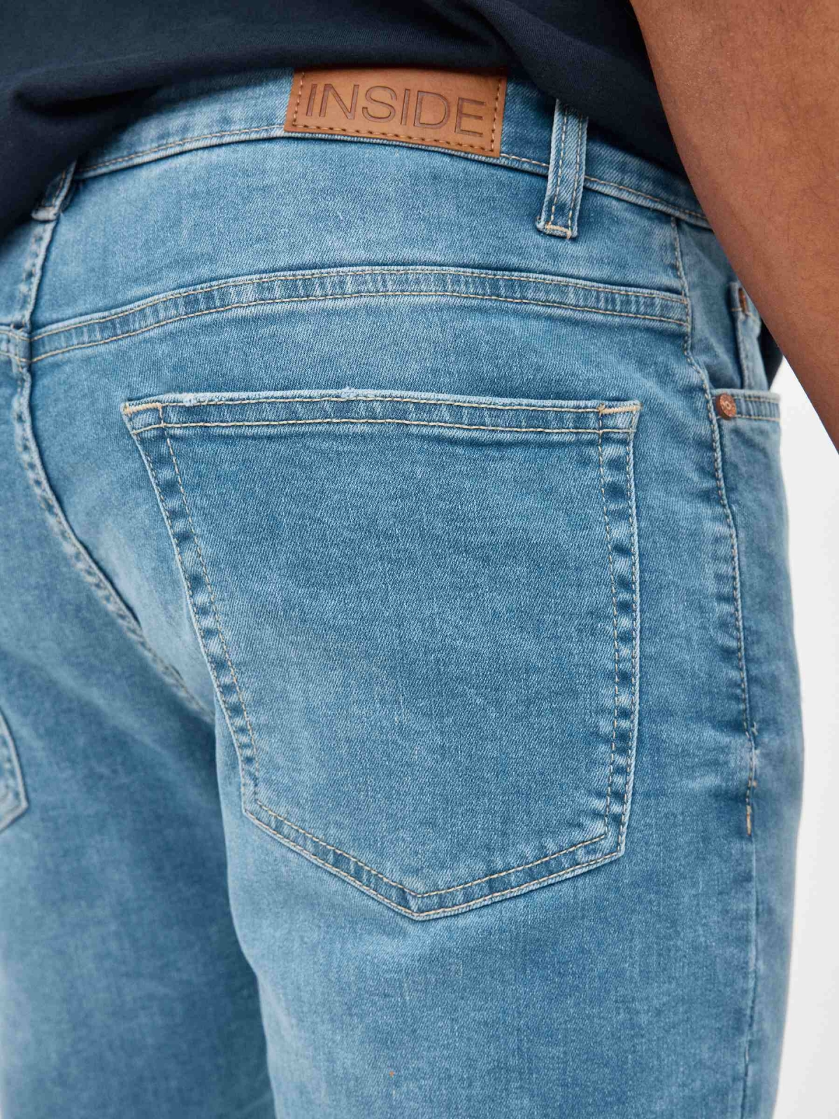 Ripped Denim Skinny Bermuda Shorts blue detail view