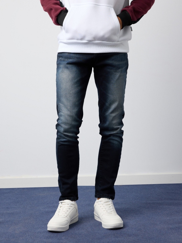 Dark slim jeans blue middle front view