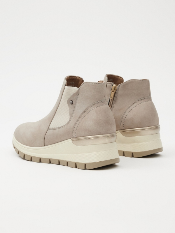 Sneaker boot style beige 45º back view