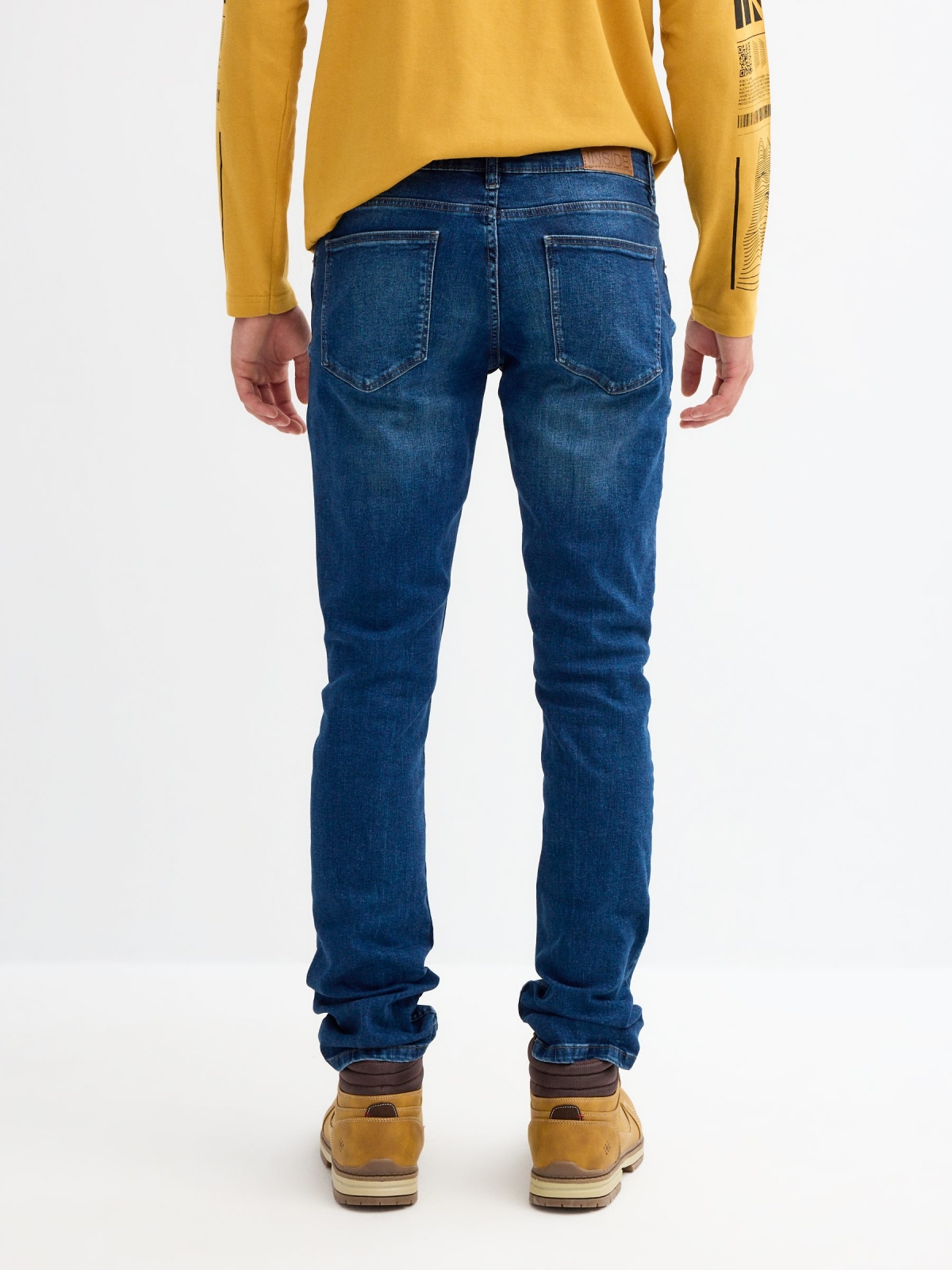 Mid rise slim denim jeans blue middle back view