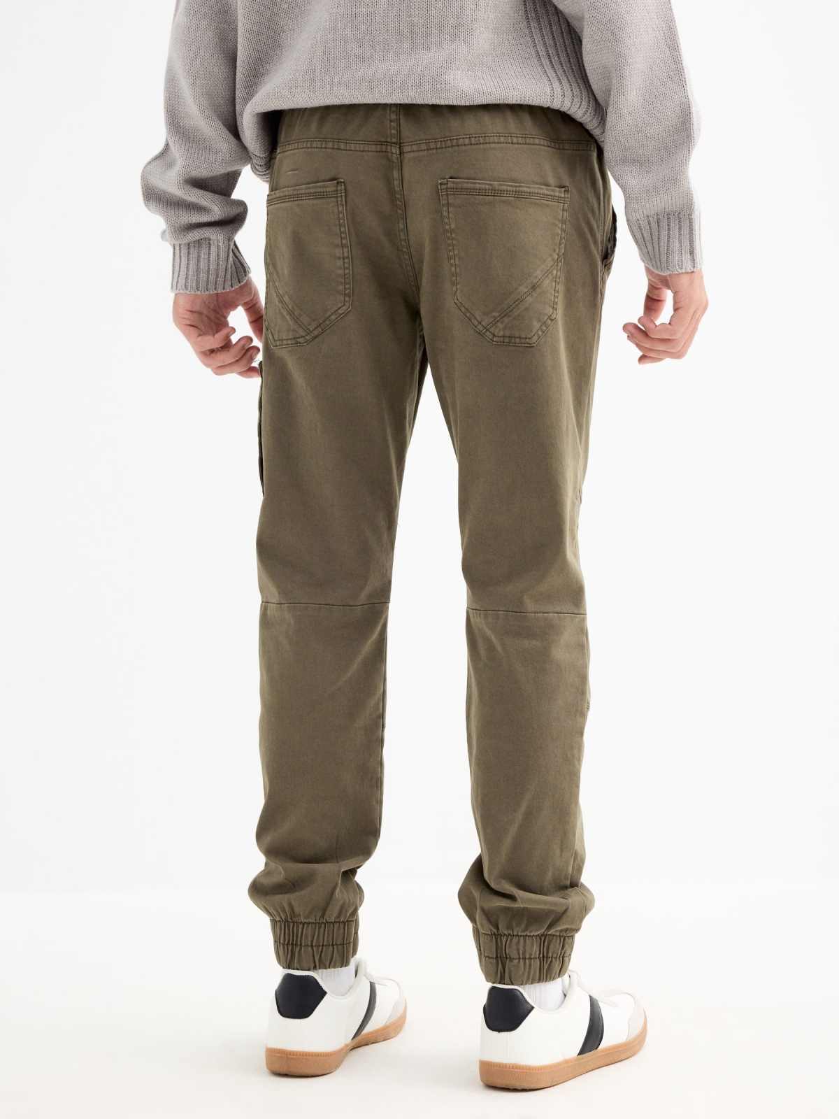 Closed pocket jogger pants green middle back view