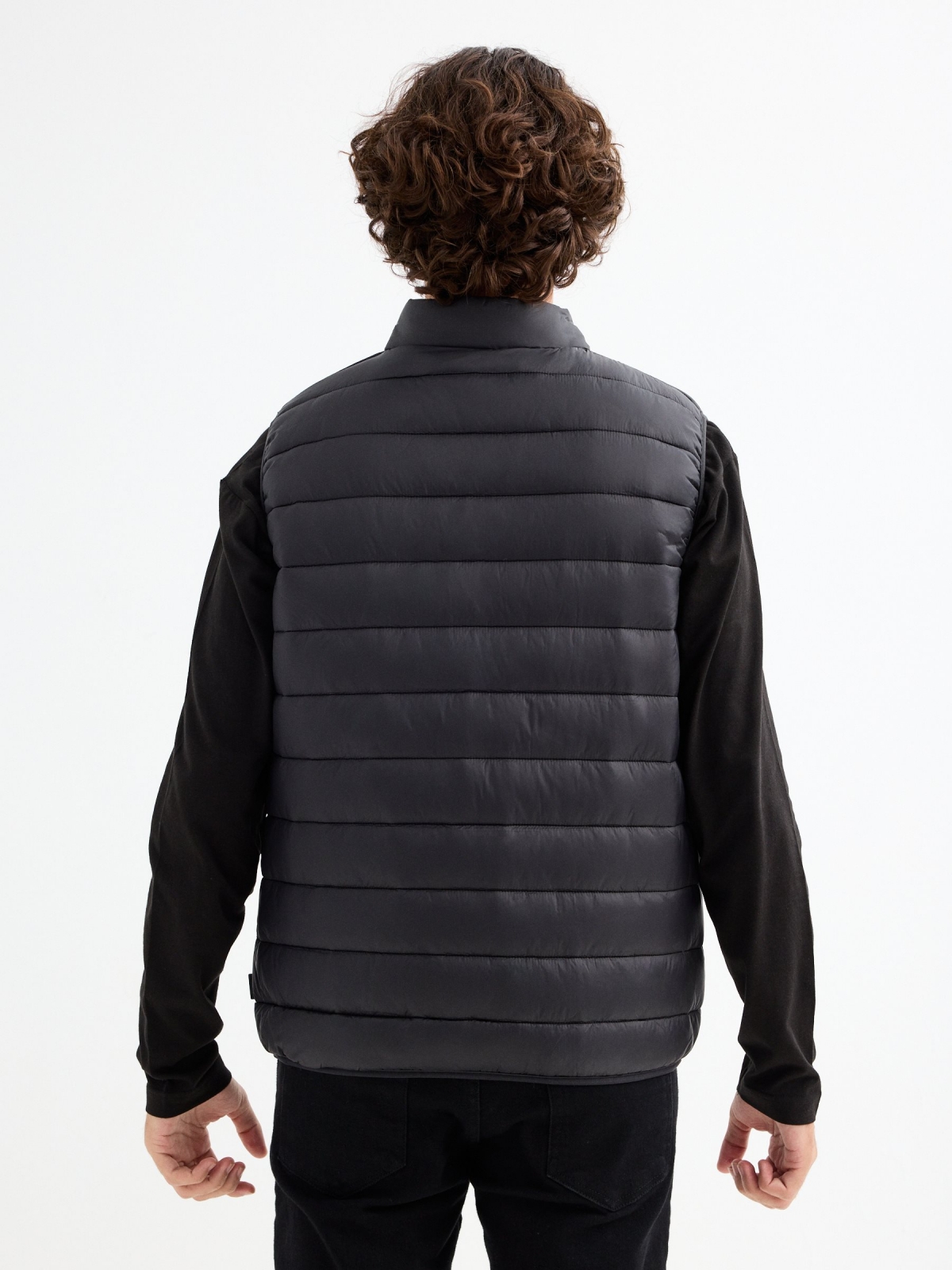 Quilted vest with graphic black middle back view