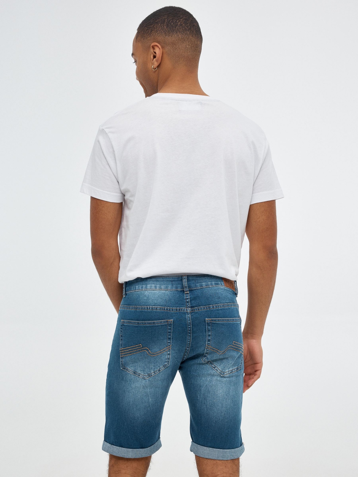 Ripped denim bermuda blue middle back view