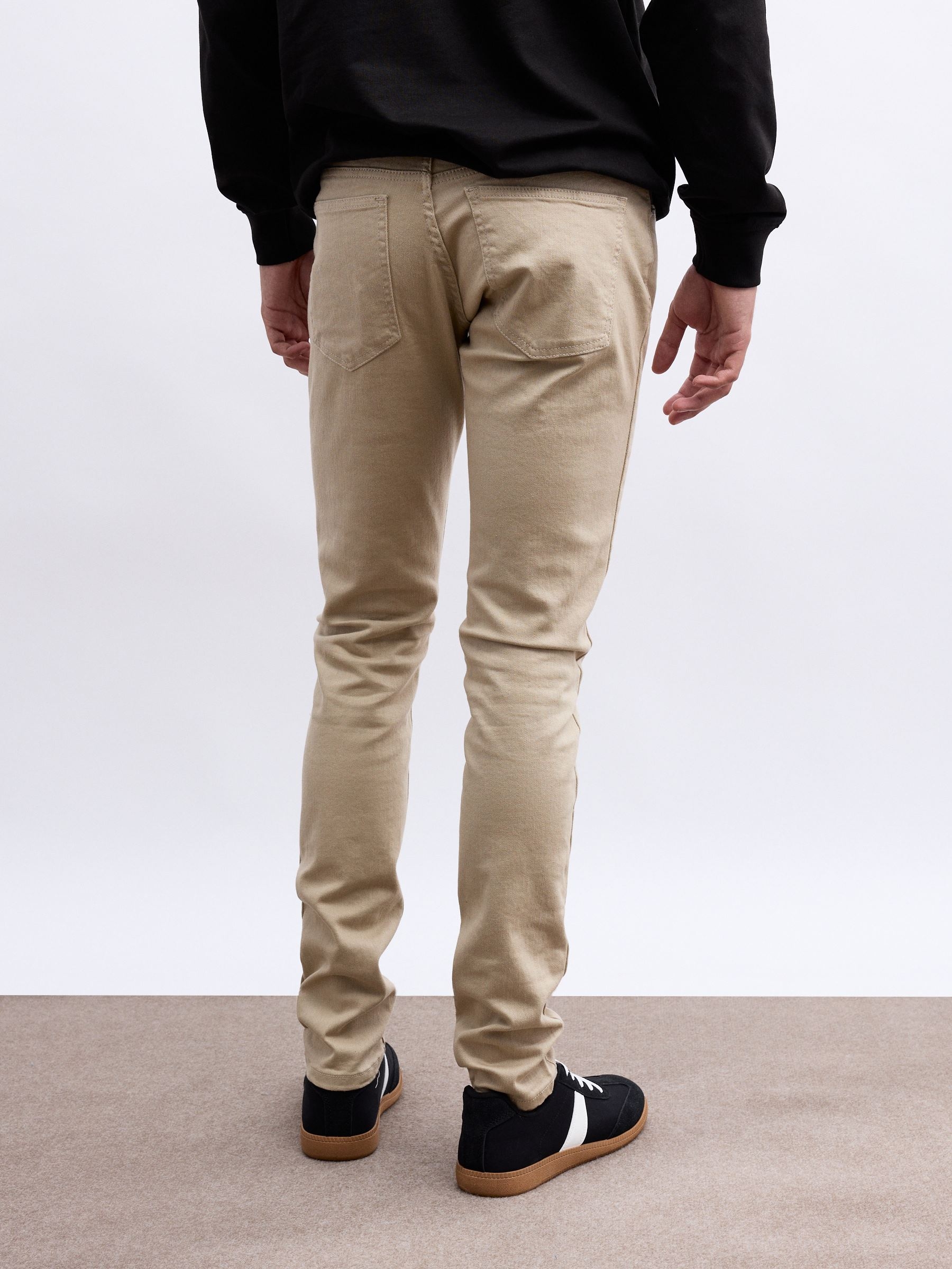 Jeans slim de colores beige vista general frontal