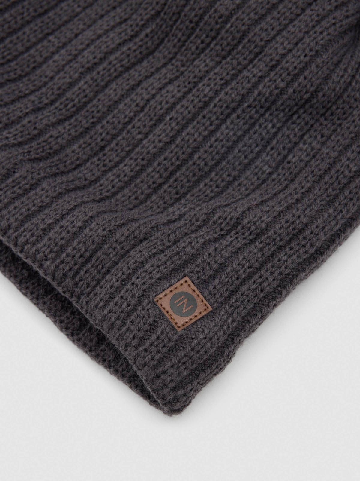 Knitted striped beanie hat black front view