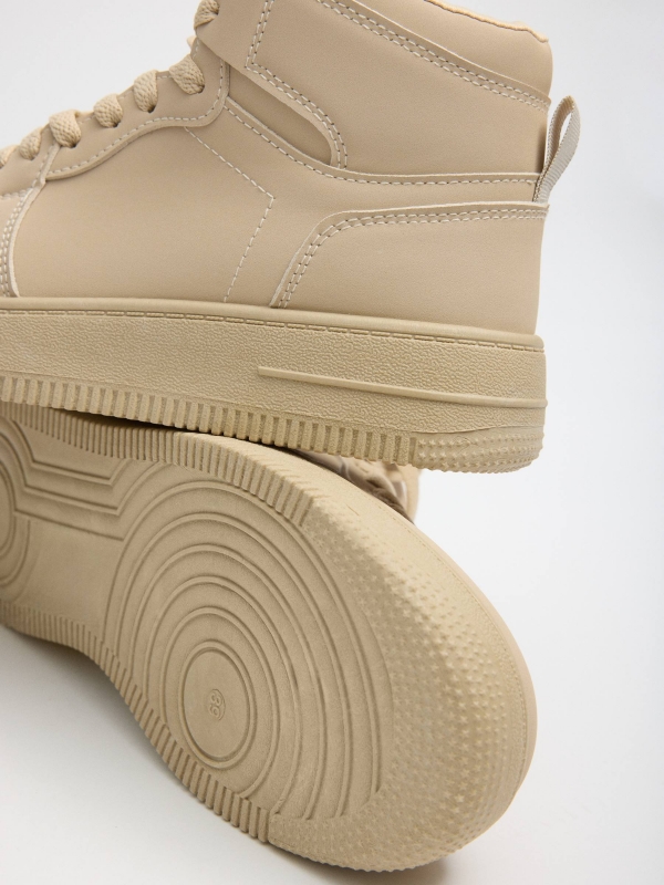 High-top basketball sneakers with platform beige detail view