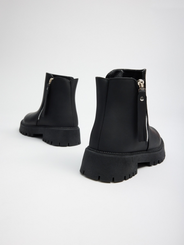 Black platform boot with zipper black detail view